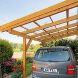 Carport mit Dach aus klaren PET Wellplatten 76/18 auf Holzkonstruktion