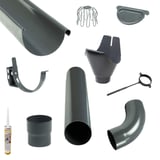 Stahl Dachrinnen Sparpaket Graphit, alle Einzelteile des Sets auf weissem Hintergrund