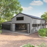 Trapezblech T18DR Aluzink 0,75 mm, als Wandverkleidung an einer grossen Garage verbaut