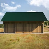 Wellblech 18/1064 Aluminium moosgrün auf einem Holzgebäude als Dachverkleidung, Anwendungsbeispiel