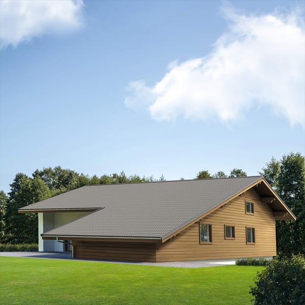 Holzhaus mit Dach aus Pfannenblech 2/1060 in Graualuminium (RAL 9007), umgeben von Bäumen
