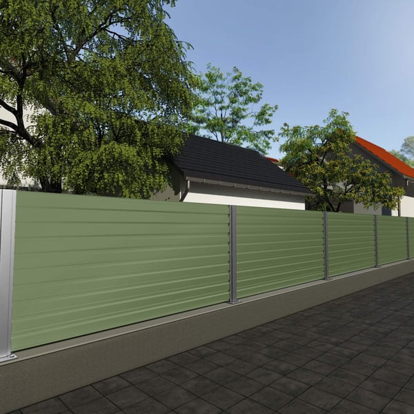 Trapezblech T35DR Wand Resedagrün als Zaun verbaut in einem Garten mit Bäumen und Häusern