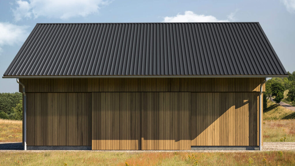 Trapezblechdach auf Holzgebäude, dunkle Farbe, robust und wetterfest im ländlichen Einsatz